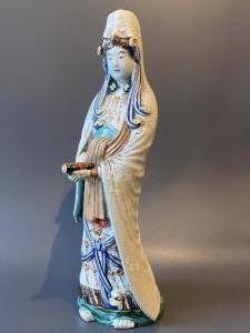 Porseleinen Geisha beeld.